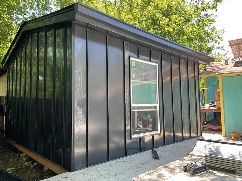 Black standing seam metal wall panels for Metal Roof Installation in Silverthorne