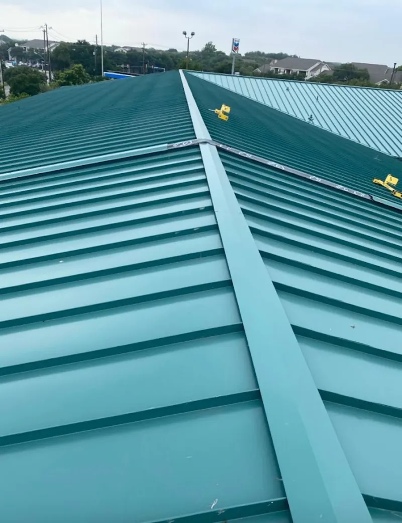 Green commercial metal roof ridge and valley for Metal Roof Repair in Silverthorne