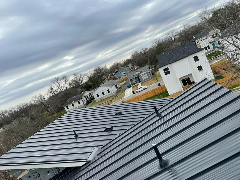 Standing seam metal roof panels with vents for Skylight Repair in Silverthorne